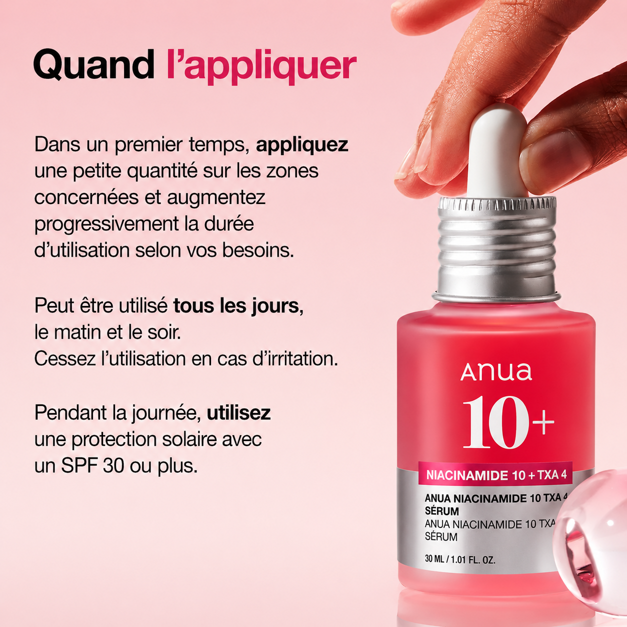 Anua skincare serum bottle with dropper on a pink background
