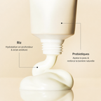 Close-up of a skincare product with text on a beige background