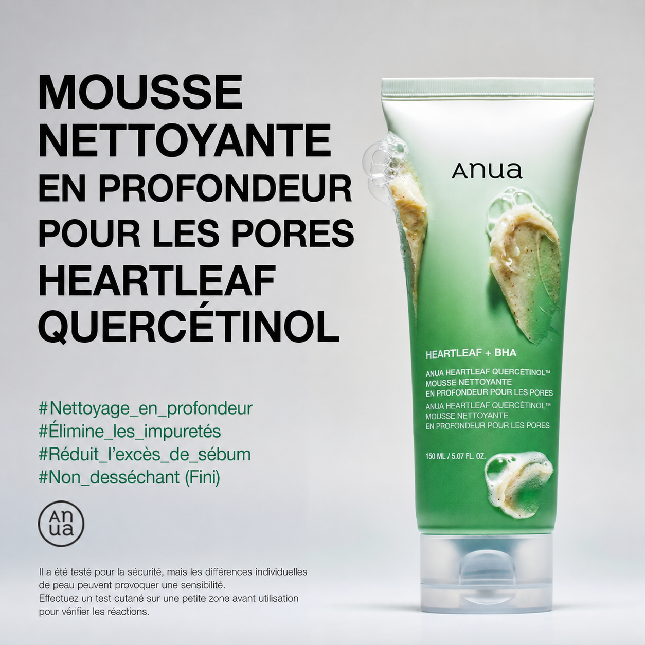 Green facial cleanser tube with text on a gray background