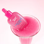 Pink skincare serum bottle with dropper on a pink background