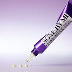 Purple tube of 'Solve by M.' with a dropper on a reflective surface and gradient background