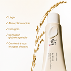 Skincare product with rice plant and text on a white background