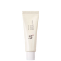 White skincare tube with text on a white background