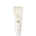 White skincare tube with text on a white background
