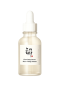 Skincare serum bottle with dropper on a white background