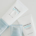 SKIN1004 Madagascan Centella sunscreen packaging on a light gray background